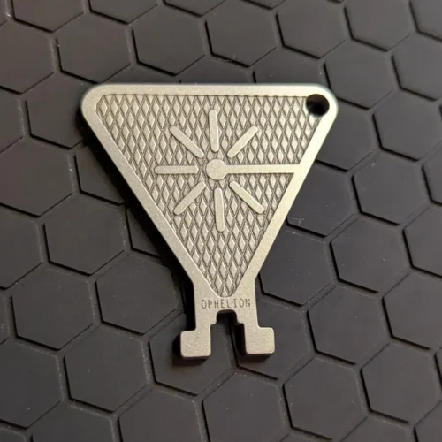 Caution key with ISO laser warning symbol on knurled field